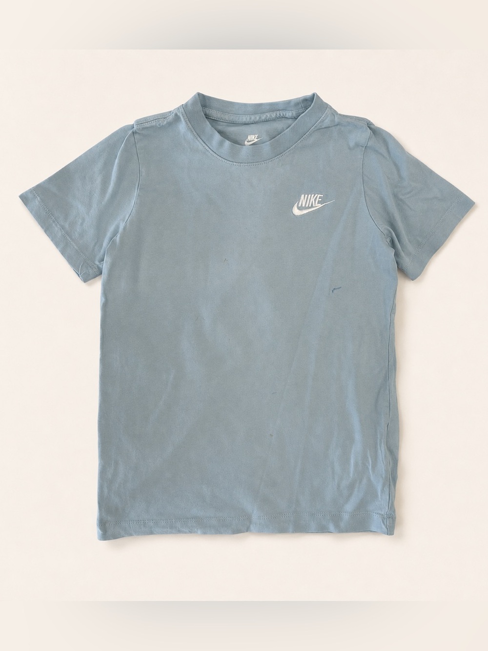 Light blue Nike crewneck basic tee with embroidered white swoosh, youth sz S